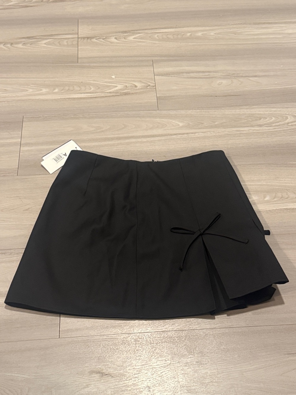 Astr Black Mini Skirt with Side Bow Accent